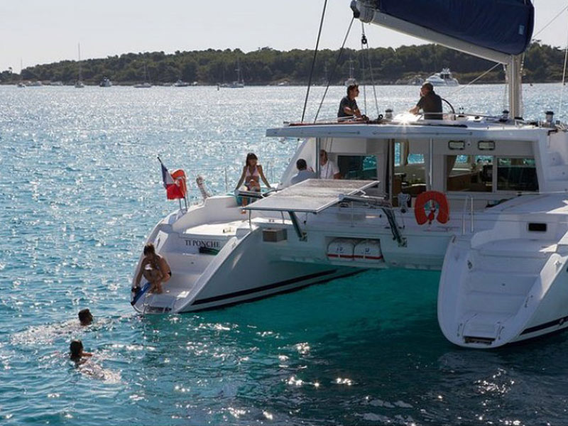 Lagoon 500 catamaran charter while anchored for swimming and relaxation
